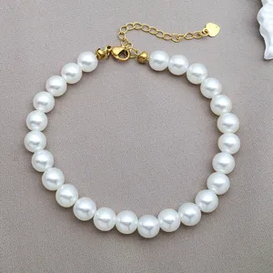 Elegant white faux pearl bracelet with gold tone extension chain for women and girls