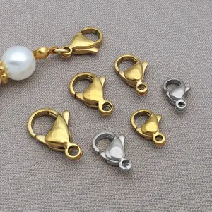 Stainless steel lobster claw clasps detail view, gold and silver jewelry making findings.