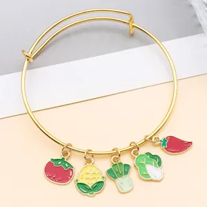 Gold tone expandable wire bangle with cute enamel vegetable charms, stylish and fun fashion accessory.