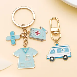Close-up detail of blue enamel medical alloy charm pendant for DIY jewelry making accessories.