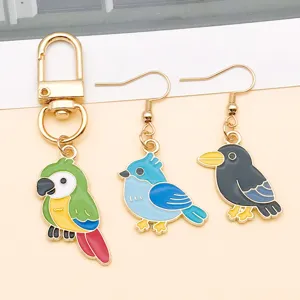 Cute cartoon bird enamel alloy keyring and earring charms, perfect for DIY jewelry making.