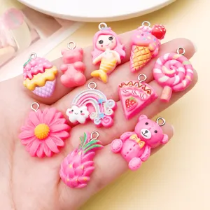 Lindos dijes de resina rosa con oso sirena arcoíris para fabricación de joyas y manualidades DIY.