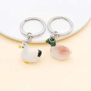 Cute resin duck keychains mini animal pendants detailed view for DIY jewelry making accessories.