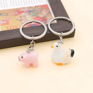 Niedliche Cartoon Harz Schwein Ente Schlüsselanhänger, DIY handgemachte Schmuck Zubehör Teile.