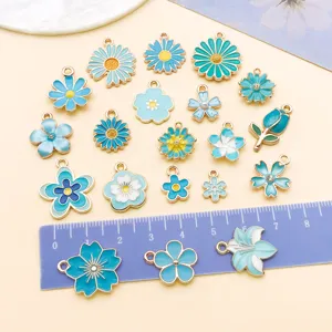 Blue enamel flower charms alloy DIY jewelry pendants for handmade bracelets necklaces crafting.