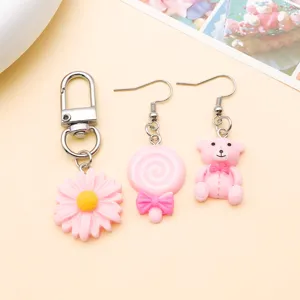 DIY hars roze madeliefje sleutelhanger en leuke beren lolly oorbellen set voor handwerk.