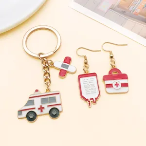Medical theme alloy enamel keychain and earrings set, cute ambulance and kit charms.