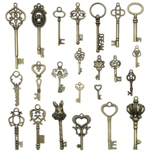 Vintage bronze alloy key charms mixed set with crown, heart and rabbit for DIY crafts.