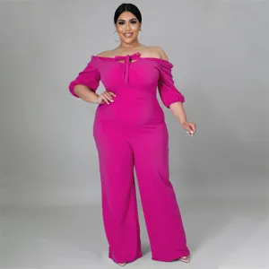 Plus size hot pink off shoulder jumpsuit with bow tie front, elegant wide leg pants for women.
