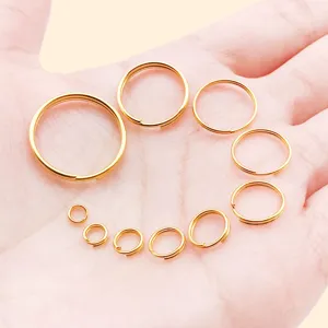 Gold double split rings for DIY jewelry making, keychains, and accessories in various sizes.