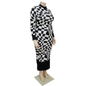 Plus size black and white checkered long sleeve dress detail showing geometric pattern and cuffs.
