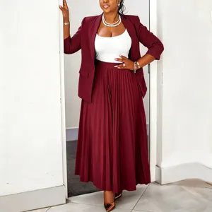 Elegant burgundy women blazer and pleated maxi skirt set for professional and casual wear.