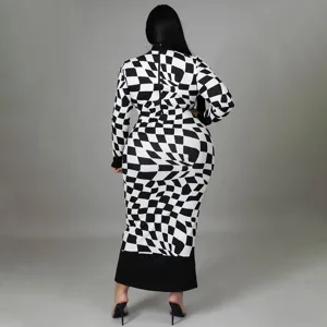 Back view detail of women's black and white checkerboard print long sleeve maxi dress.