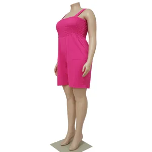 Close-up detail of women's solid color smocked romper, showing side profile and design.