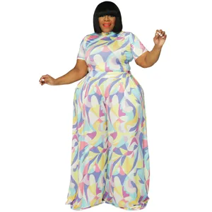 Completo taglie forti donna due pezzi stampa astratta top maniche corte pantaloni.