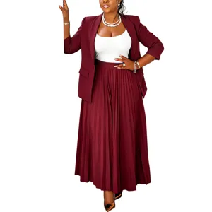 Detailed view of women elegant business casual blazer and pleated long skirt two piece set.