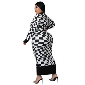 Close-up detail view of the black and white checkerboard long sleeve dress with slim fit.