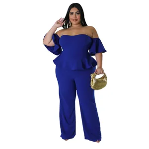 Combinaison pantalon longue stretch bleue roi épaules dénudées manches courtes femme.