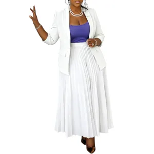 Detail view of women's professional white blazer and pleated maxi skirt suit set.