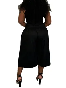 Detail view of black plus-size wide-leg casual pants showcasing back design and loose fit.