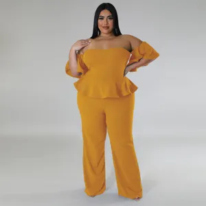 Combinaison pantalon large manches courtes épaules dénudées moutarde pour femme.