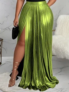 Green pleated maxi skirt detail featuring high waist, metallic finish and high side slit.
