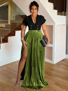 Detailed view of the women's stylish pleated high-slit maxi skirt and black top.