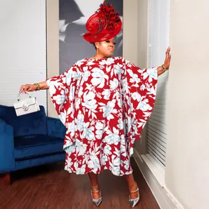 Plus size kimono sleeve floral kaftan dress featuring comfortable loose fit and vibrant print.