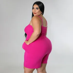 Pink plus size smocked romper detail showing pocket and strap design, comfortable summer wear.