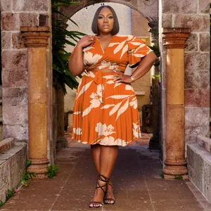 Detailed view of plus size floral print two piece set featuring V-neck and flutter sleeves.
