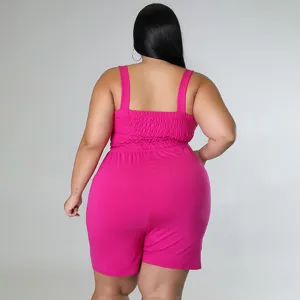 Plus size bright pink sleeveless smocked back romper for women, casual summer daily wear jumpsuit.