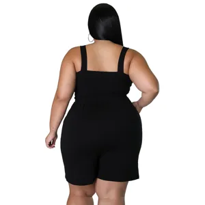 Detailed back view of the stylish black sleeveless smocked romper, showcasing slim fit.