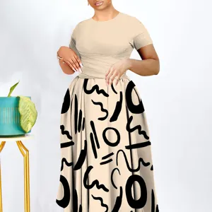 Plus size short sleeve maxi dress with abstract print and elegant pleated waist design.
