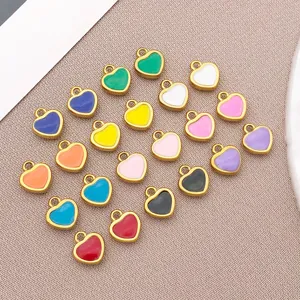 Close-up detail shot of colorful enamel heart pendants, perfect for DIY jewelry making accessories.