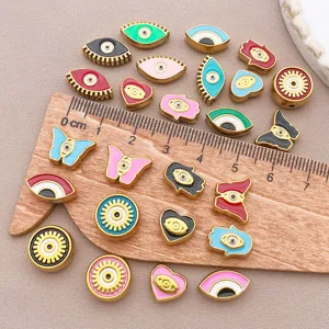 Perles d'espacement oeil maléfique papillon main Hamsa en acier inoxydable pour bijoux DIY.