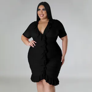 Detailed view of plus size black mesh ruffle dress, V-neck design, premium fabric.