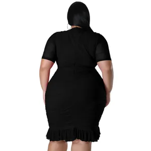 Detail view of plus size black mesh splice ruched ruffle hem sexy dress from back.