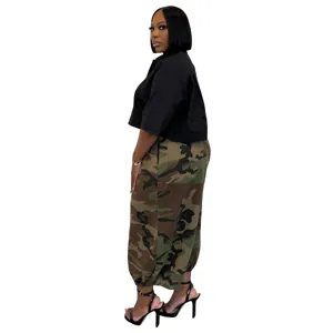 Conjunto de moda mujer talla grande camisa negra de manga corta y pantalón harem.