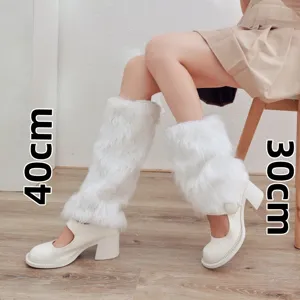 Detailed view of white fluffy faux fur leg warmers paired with retro block heel Mary Janes.