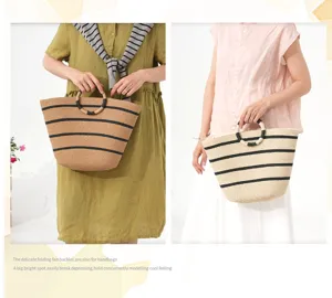 Summer straw woven tote bag with vintage black stripes and round handle for women vacation.