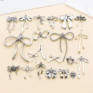 Mixed 20 styles antique silver bow charms zinc alloy hollow DIY jewelry pendants for bracelet keychain