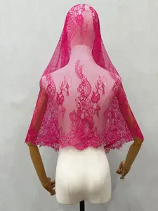Close-up detail of fuchsia floral lace veil showing intricate woven pattern and delicate edge.