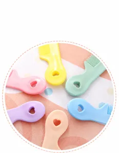 Candy color mini portable hair comb detail display, cute children hair styling tool.