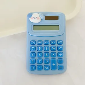 Cute mini blue calculator with adorable cartoon dog decoration for students and office use.