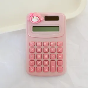 Detailed view of cute pink cartoon electronic calculator, compact portable desktop device.