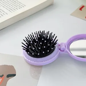 Brosse a cheveux pliable compacte avec miroir, mini peigne de massage coussin d air portable.