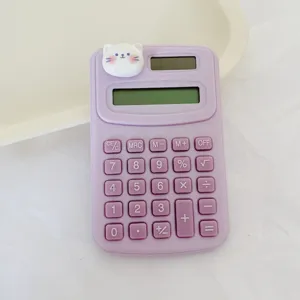 Purple cute cat mini calculator detail view, portable electronic desktop calculation device.