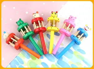 Wooden baby rattle set with colorful cartoon animal designs and bells for infant early learning.