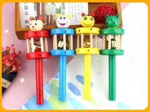 Wooden baby rattle toy set with colorful cartoon animal heads and built-in metal bells for kids.