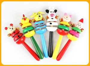 Wooden animal baby rattle toy detail, colorful wooden handle with cute animal head and small bells.